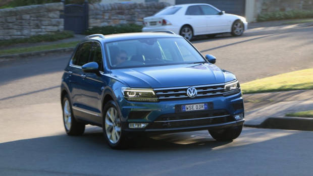 A Volkswagen Tiguan TDI in Caribbean Blue cornering