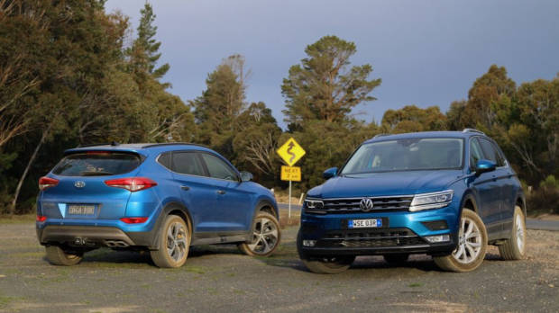 A Caribbean Blue Volkswagen Tiguan and Ara Blue Hyundai Tucson off road in Australia