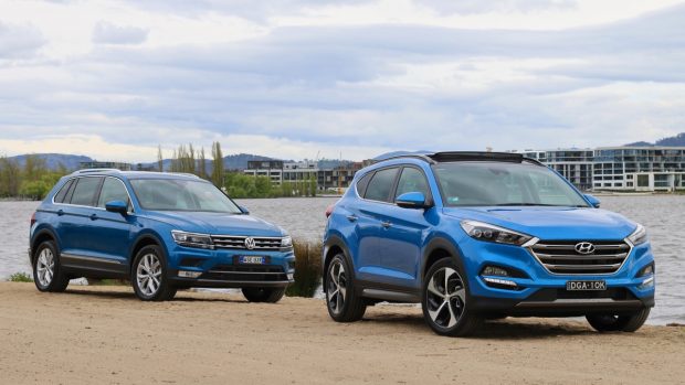 A Caribbean Blue Volkswagen Tiguan and Ara Blue Hyundai Tucson in Australia