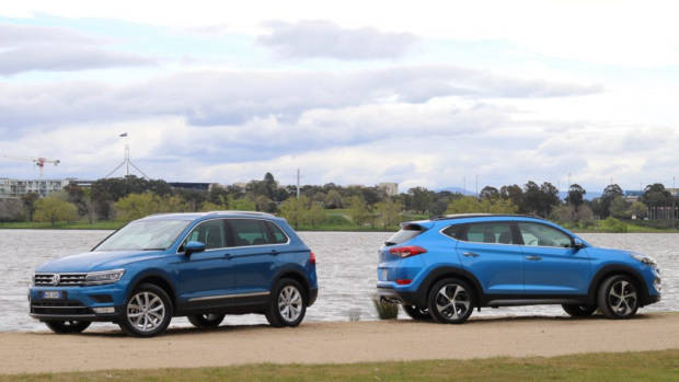 A Caribbean Blue Volkswagen Tiguan and Ara Blue Hyundai Tucson in Australia
