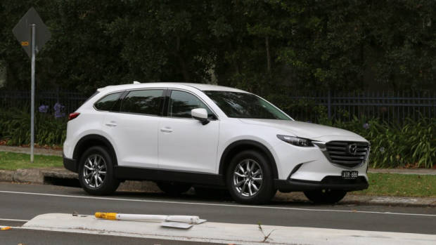 2017 Mazda CX-9 Snowflake White side – Chasing Cars