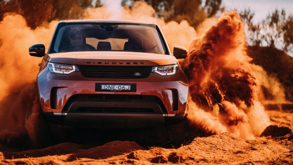 2017 Land Rover Discovery First Edition Namib Orange Off Road – Chasing Cars