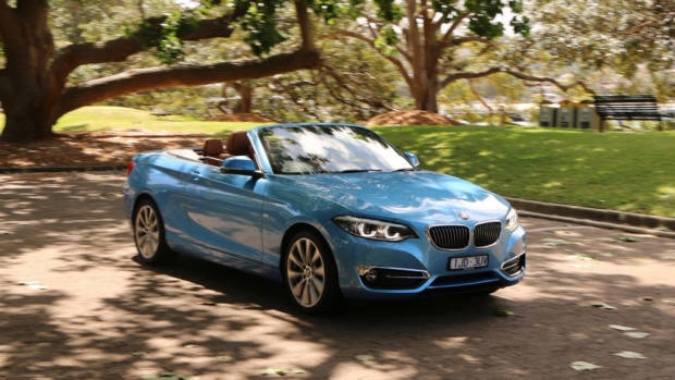 2018 BMW 230i Convertible Seaside Blue Driving