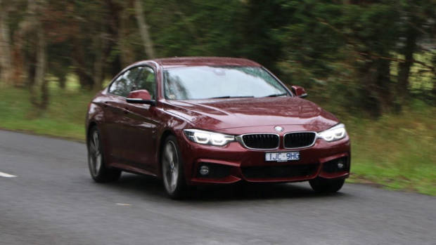 2018 BMW 440i Gran Coupe Review Aventurine Red Hatchback Driving Front End