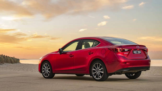 2018 Mazda 3 Astina sedan Soul Red Crystal rear 3/4
