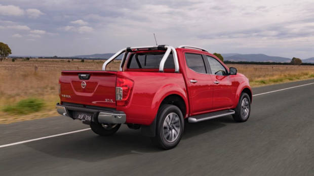 2018 Nissan Navara ST-X Review Burning Red Rear End Driving