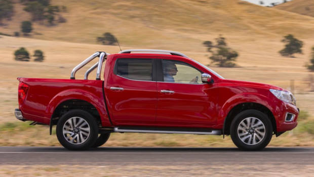 2018 Nissan Navara ST-X Review Burning Red Side Profile Driving