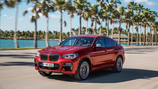 2019 BMW X4 M40i red front 3/4 motion