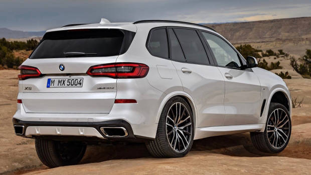 2019 BMW X5 M Sport white rear 3/4