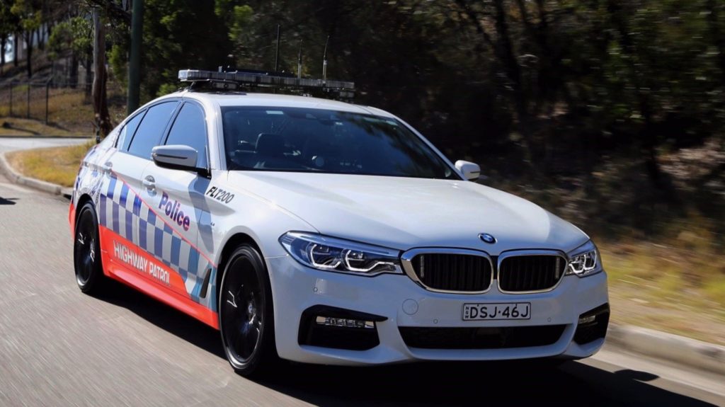 BMW 530d NSW Police front 3/4 moving