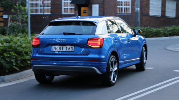 Audi Q2 sport Ara Blue back end driving
