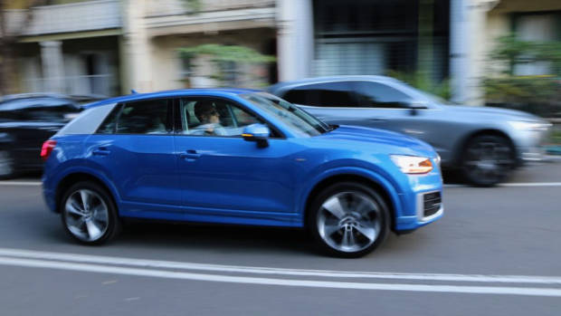 Audi Q2 sport Ara Blue profile driving