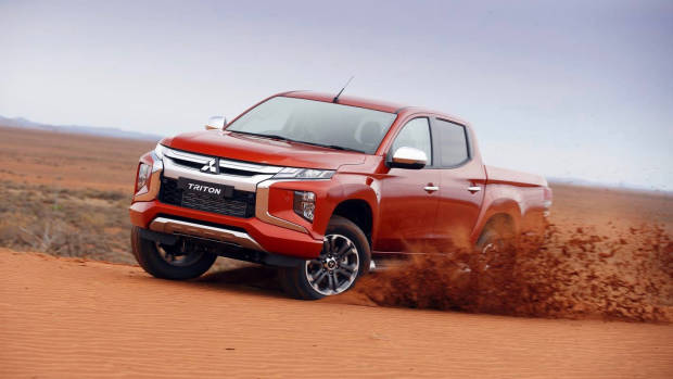 2019 Mitsubishi Triton orange front 3/4