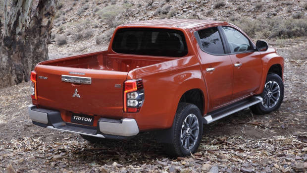 2019 Mitsubishi Triton orange rear 3/4