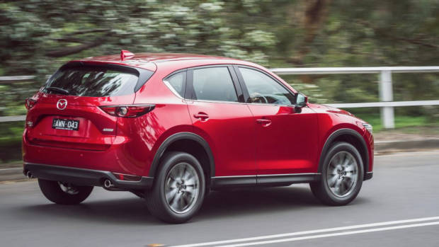 2019 Mazda CX-5 Akera Soul Red Crystal rear 3/4 driving