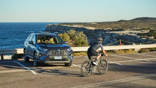 Grey Toyota RAV4 Cruiser Hybrid front end
