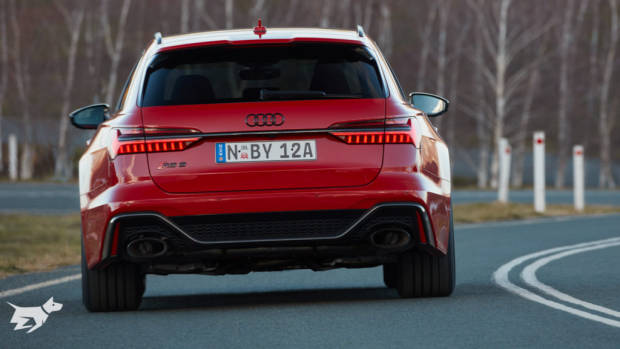 2020 Audi RS6 Avant in Tango Red driving on the road