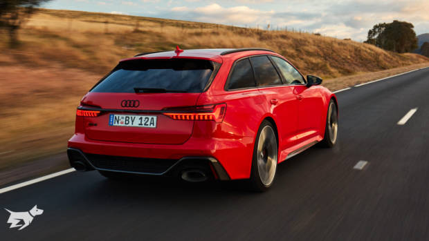 2020 Audi RS6 Avant in Tango Red driving on the road