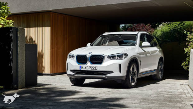 BMW iX3 electric SUV in driveway