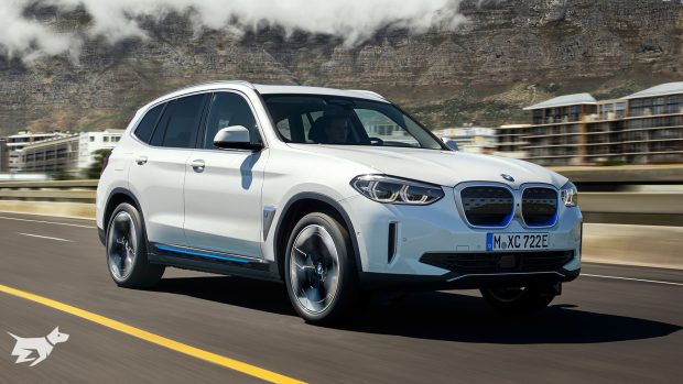 BMW iX3 electric SUV next to dam