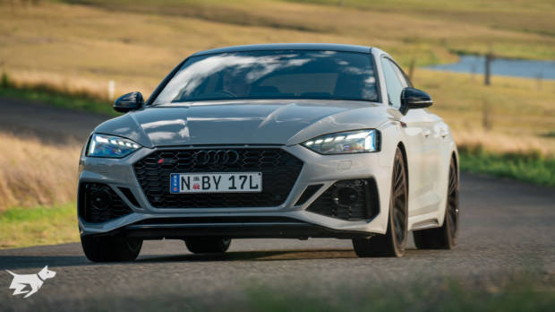 The 2021 Audi RS5 Sportback driving on a country road