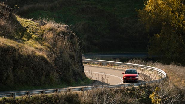 Volkswagen Golf GTI 2021 Kings Red driving