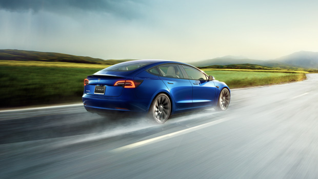 Tesla Model 3 2021 rear driving