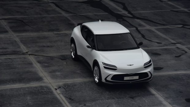 2022 Genesis GV60 white exterior front three quarter far away