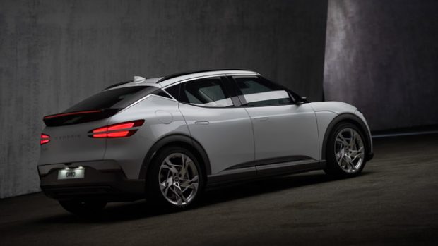 2022 Genesis GV60 white exterior rear three quarter dark