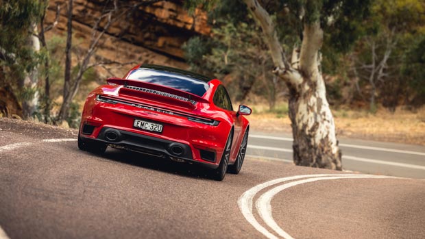 Porsche 911 Turbo 2022 rear 3/4 driving