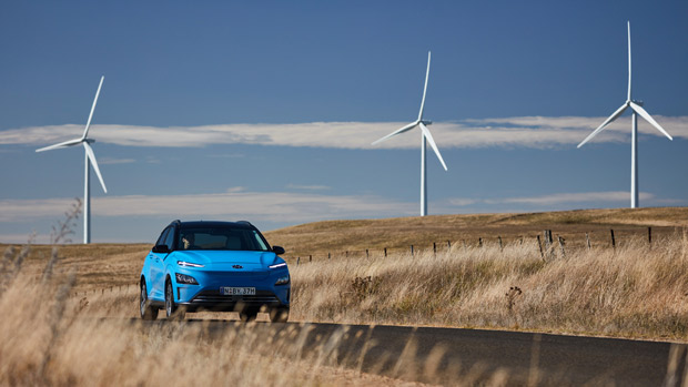 2021 Hyundai Kona Highlander Electric Exterior Blue front-three quarter driving