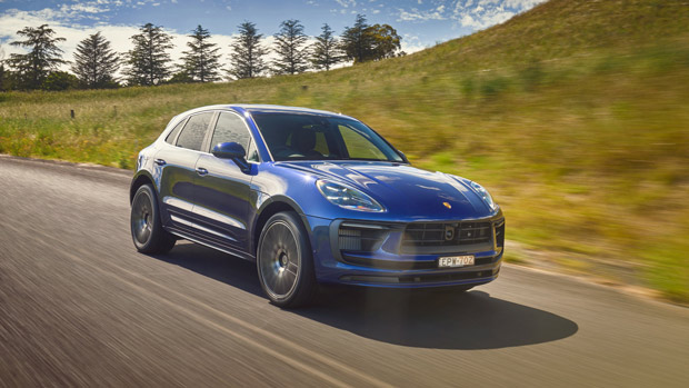 2022 Porsche Macan S SUV blue exterior front 3/4 driving