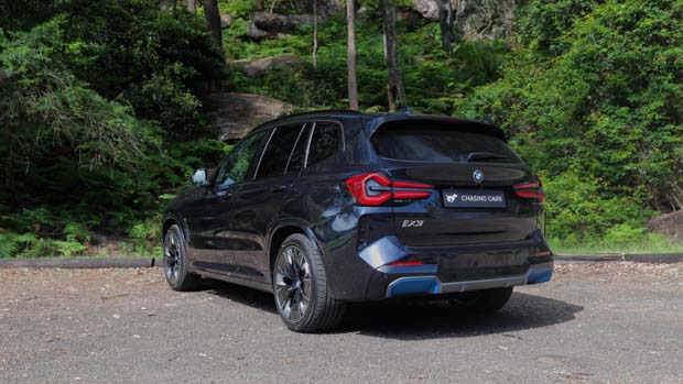 2022 BMW iX3 M Sport black exterior rear 3/4