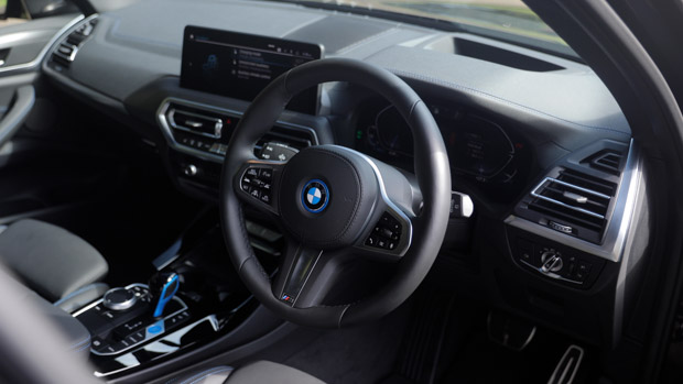 2022 BMW iX3 M Sport black interior driving position