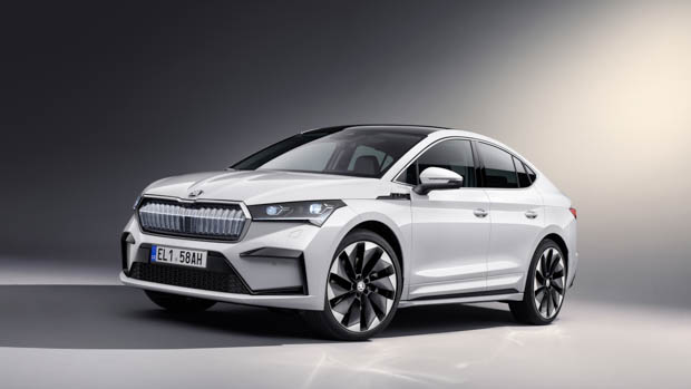 A Skoda Enyaq coupe SUV painted white in a studio