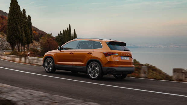 Skoda Karoq 2022 orange on road