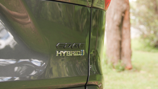 Toyota RAV4 Edge Hybrid SUV grey exterior - boot rear badge