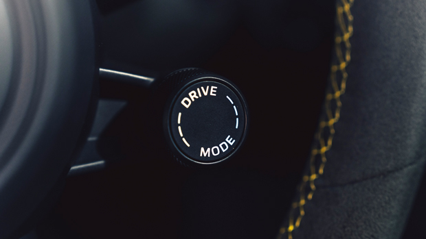 2022-Porsche-911-GTS-coupe-yellow---interior,-drive-mode-dial