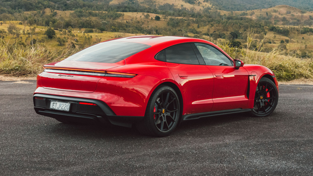 2022 Porsche Taycan GTS sedan red - static rear 3/4