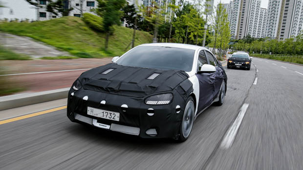 Hyundai Ioniq 6 prototype driving close
