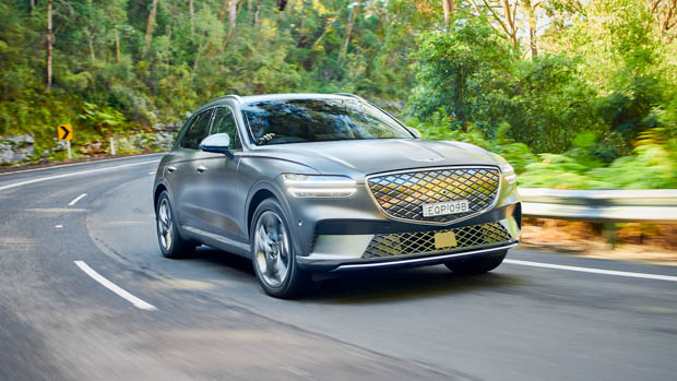 Genesis electrified GV70 cornering on road