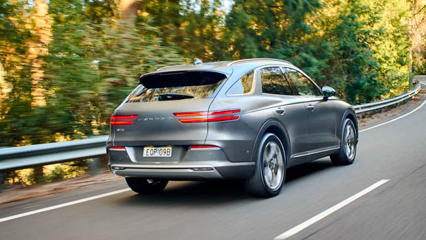Genesis electrified GV70 rear driving shot