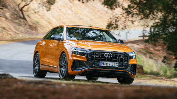 Audi SQ8 2023 dragon orange driving front end