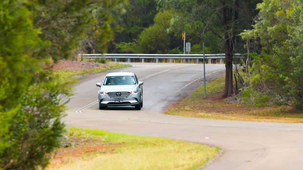 Mazda CX-9 Sport 2022 front 3/4 driving 3