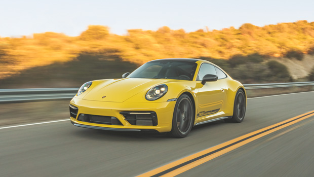 Porsche 911 Carrera T 2023 front 3/4 driving mountains