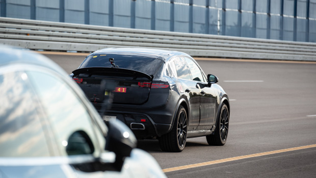 Porsche Macan EV 2024 rear driving