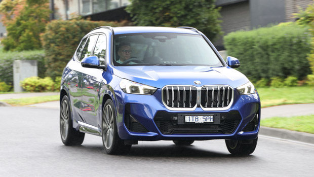 BMW X1 20i M Sport 2022 driving front 3/4 2