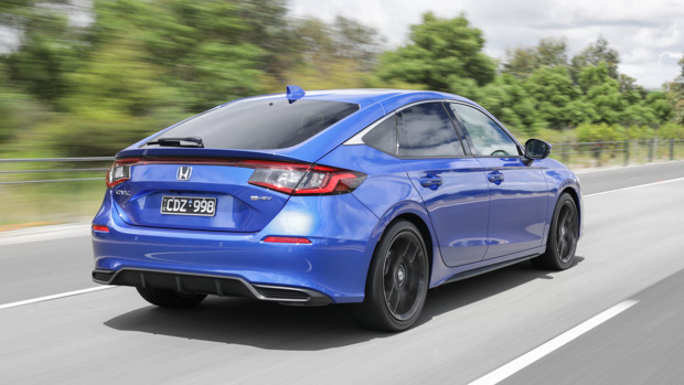 Honda Civic eHEV 2023 rear 3/4 driving