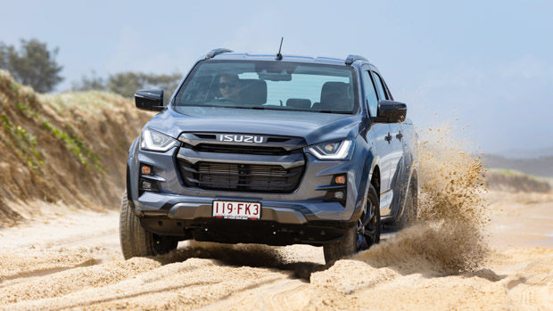 Isuzu D-Max X-Terrain 2023 front driving beach close