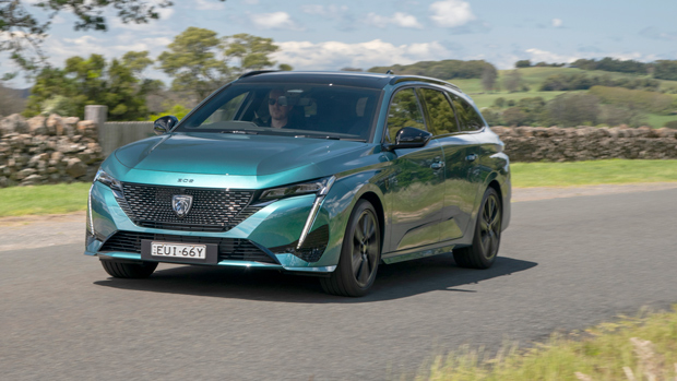 2023 Peugeot 308 GT Premium Wagon exterior driving front 3/4